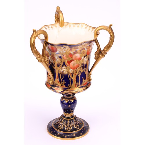 119 - A Royal Crown Derby Imari three handled pedestal vase, in the Art Nouveau manner, decorated with fru... 