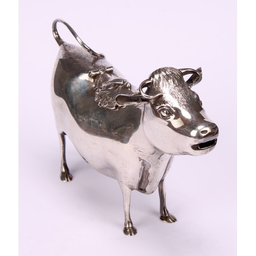 651 - A George III style silver cow creamer, in the manner of John Schuppe, hinged cover, 15cm long, Willi... 