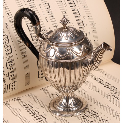 578 - A 19th century Continental silver ovoid pedestal teapot, fluted and chased with Neo-Classical ribbon... 