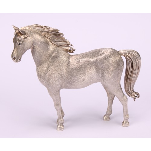 617 - A French cast silver model of a horse, chased fur, sapphire eyes, 10cm long, Bry & Co, Paris, 400g, ... 