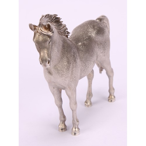 617 - A French cast silver model of a horse, chased fur, sapphire eyes, 10cm long, Bry & Co, Paris, 400g, ... 