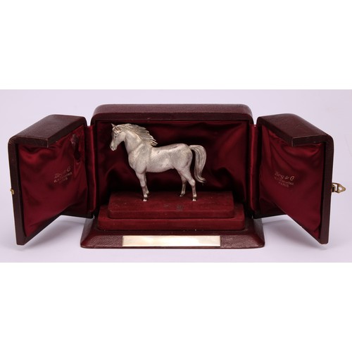 617 - A French cast silver model of a horse, chased fur, sapphire eyes, 10cm long, Bry & Co, Paris, 400g, ... 