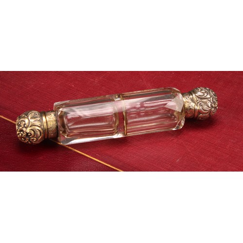 587 - A 19th century gilt silver coloured metal double ended scent bottle, domed screw-fitting and hinged ... 