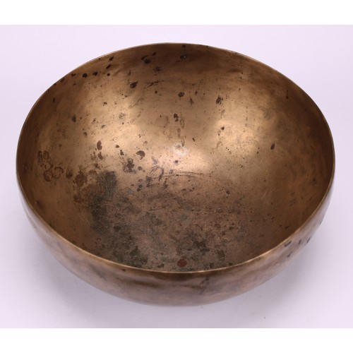 1299 - A Tibetan bronze singing bowl, 19cm diam, 19th century