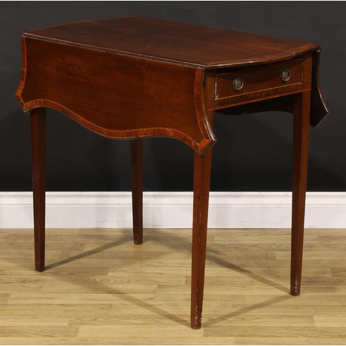 1409 - A George III tulipwood crossbanded mahogany butterfly Pembroke table, serpentine rectangular top wit... 