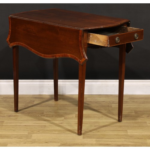 1409 - A George III tulipwood crossbanded mahogany butterfly Pembroke table, serpentine rectangular top wit... 