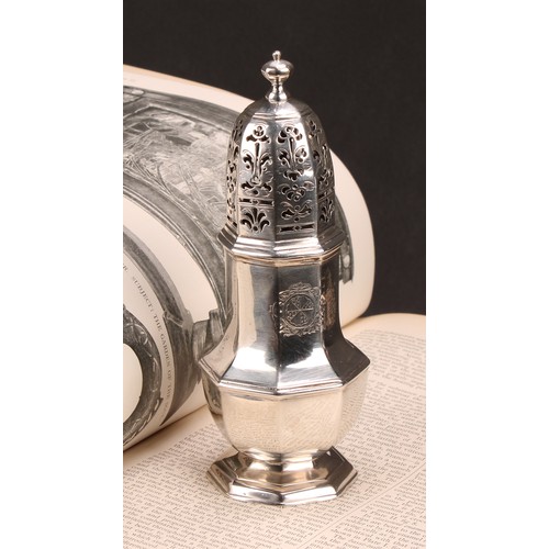 624 - A George II silver octagonal baluster sugar caster, knop finial, pierced cover, domed foot, crested,... 