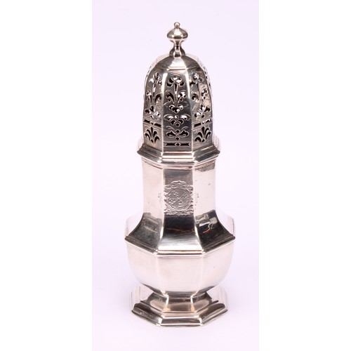 624 - A George II silver octagonal baluster sugar caster, knop finial, pierced cover, domed foot, crested,... 