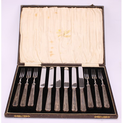 531 - An Art Deco silver dessert service, comprising six pairs of knives and forks, Barker Brothers Silver... 