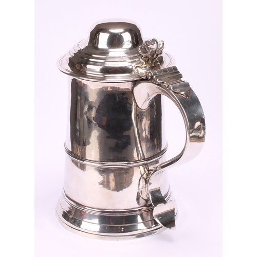 645 - A George III silver spreading cylindrical tankard, hinged domed cover, pierced chair-back thumbpiece... 