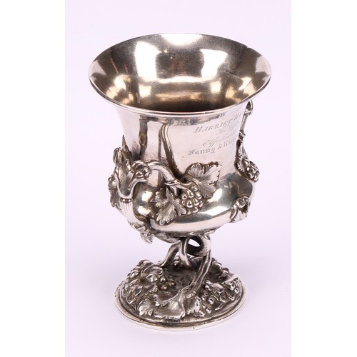 577 - A 19th century Anglo-Indian silver campana shaped two-handled cup, of substantial gauge, boldly cast... 