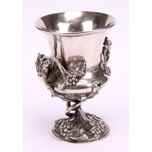 577 - A 19th century Anglo-Indian silver campana shaped two-handled cup, of substantial gauge, boldly cast... 