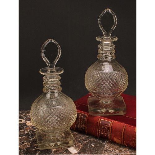 174 - A pair of large post-Regency hobnail-cut glass mallet shaped decanters, probably Irish, each with te... 