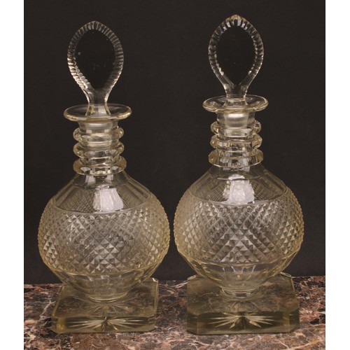 174 - A pair of large post-Regency hobnail-cut glass mallet shaped decanters, probably Irish, each with te... 