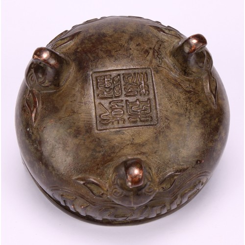 202 - A Chinese bronze ding tripod censer, for the Islamic market, cast with Arabic calligraphy, verse fro... 