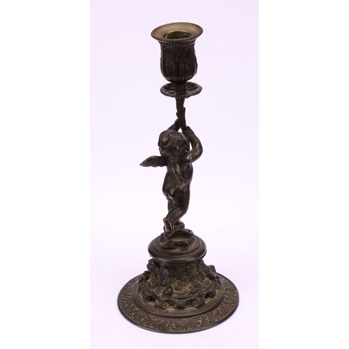 1569 - A pair of 19th century bronze figural candlesticks, cast in the renaissance revival taste as scantil... 