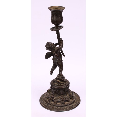 1569 - A pair of 19th century bronze figural candlesticks, cast in the renaissance revival taste as scantil... 