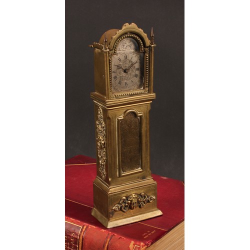 1915 - An early 20th century lacquered brass novelty timepiece, as a miniature longcase clock, 5cm arched s... 