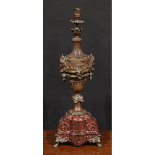 1367 - A French fin de siècle bronze and rouge marble table lamp, cast with masks, scrolls and acanthus, fr... 