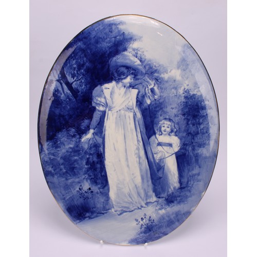 3 - A 19th century earthenware oval plaque, painted in the manner of Doulton in tones of blue with a mot... 