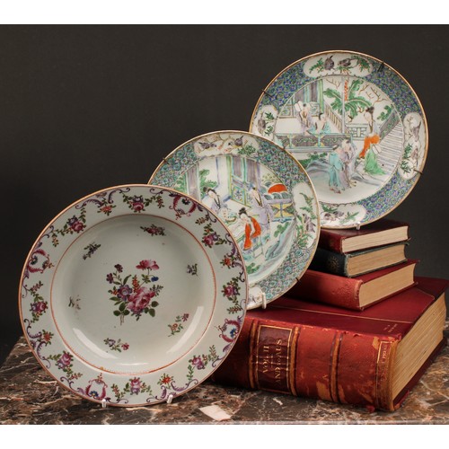 267 - A pair of Chinese circular plates, painted in polychrome with domestic scenes, 20cm diameter, 19th c... 