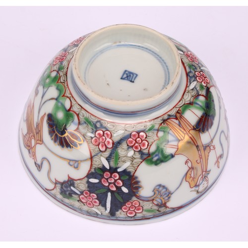 273 - An 18th century Chinese ovoid pedestal tea caddy, painted in polychrome with figures and a dog in co... 