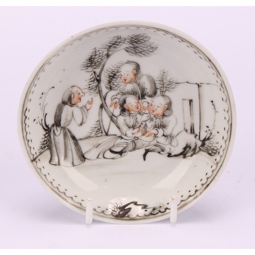 264 - A mid 18th century Chinese Jesuit tea bowl, painted en grisaille with putto and girl, with flowers a... 