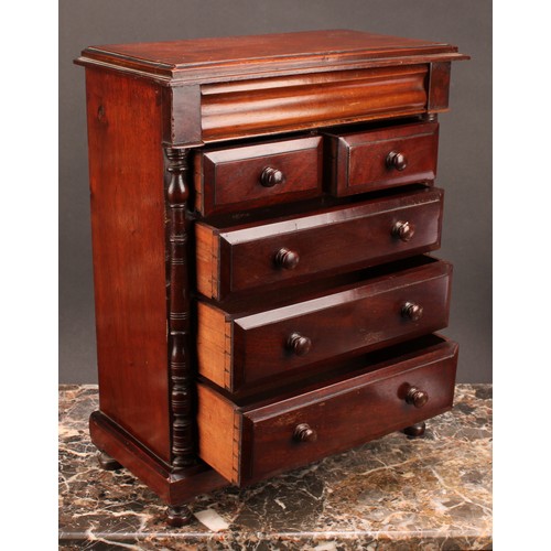 1943 - Miniature Furniture - a Victorian mahogany chest, rectangular top above a concave frieze drawer, two... 