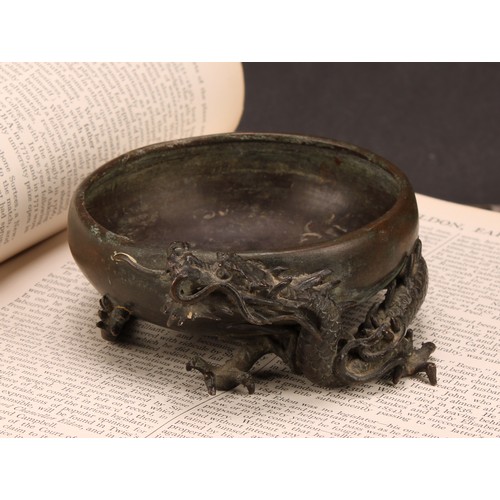 249 - A Japanese bronze censer or brush washer, cast with a ferocious dragon, 10cm diam, signed, Meiji per... 