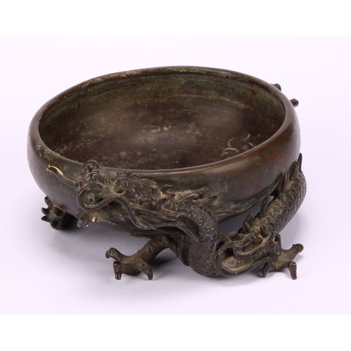 249 - A Japanese bronze censer or brush washer, cast with a ferocious dragon, 10cm diam, signed, Meiji per... 