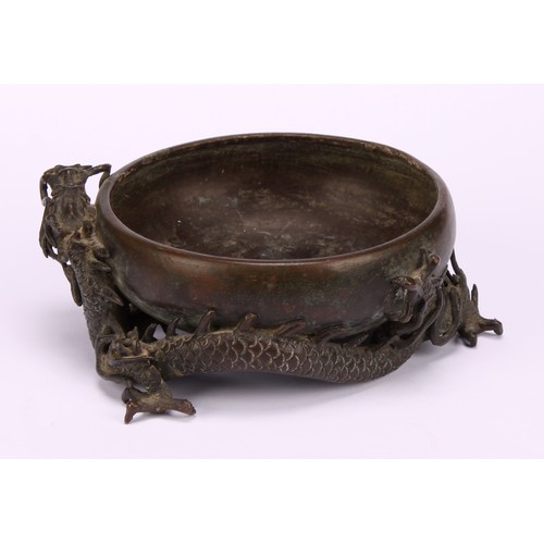 249 - A Japanese bronze censer or brush washer, cast with a ferocious dragon, 10cm diam, signed, Meiji per... 