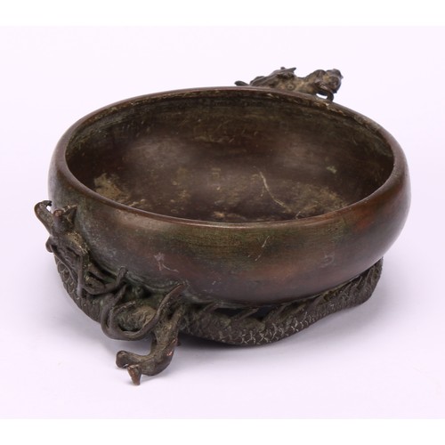 249 - A Japanese bronze censer or brush washer, cast with a ferocious dragon, 10cm diam, signed, Meiji per... 