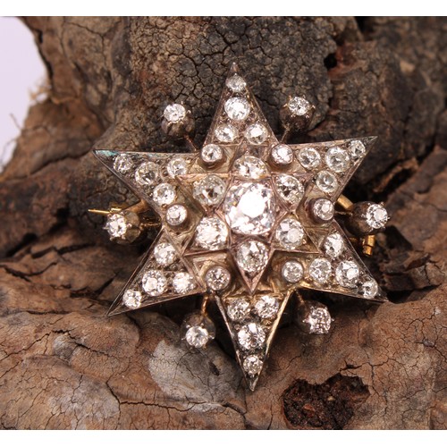 962 - An early 20th century diamond set six pointed star pendant brooch, the whole set with 43 old brillia... 