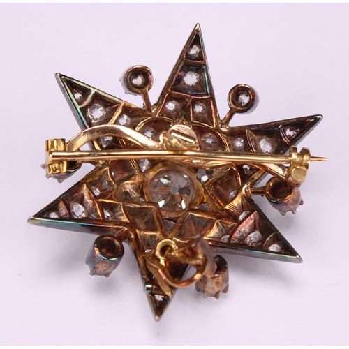 962 - An early 20th century diamond set six pointed star pendant brooch, the whole set with 43 old brillia... 