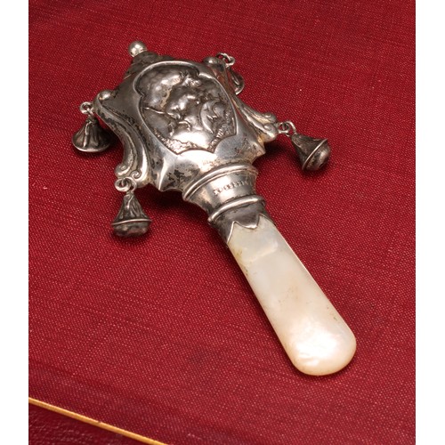 656 - A George V Scottish silver novelty nursery rhyme baby's rattle, embossed with the cow and the moon f... 