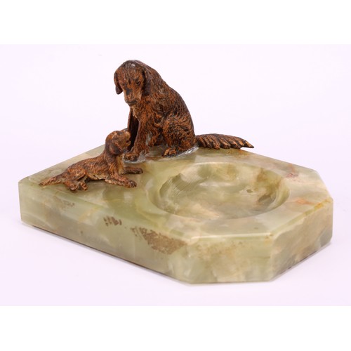 1307 - An Austrian cold painted bronze group, a dog and a pup, mounted on a green onyx pin dish, 8.5cm wide... 