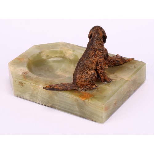 1307 - An Austrian cold painted bronze group, a dog and a pup, mounted on a green onyx pin dish, 8.5cm wide... 