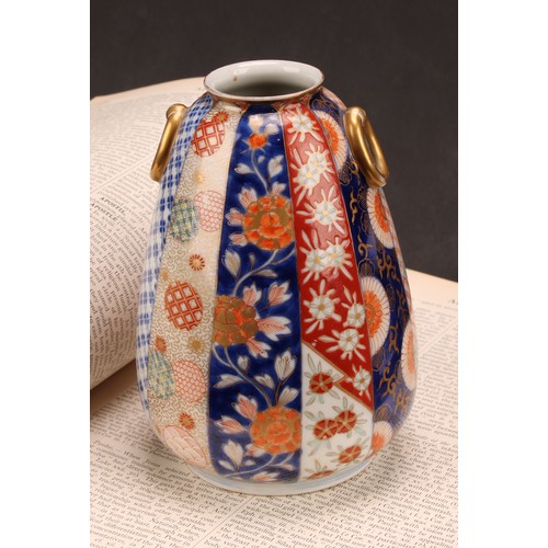 232 - A Japanese Fukagawa porcelain ovoid vase, decorated in the Imari palette, 15cm high, early 20th cent... 