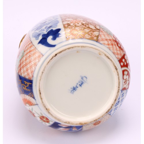 232 - A Japanese Fukagawa porcelain ovoid vase, decorated in the Imari palette, 15cm high, early 20th cent... 