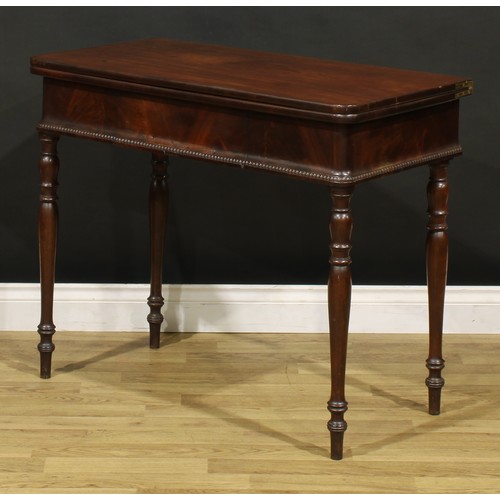 1484 - A 19th century mahogany tea table, hinged top above a frieze drawer, turned legs, 75.5cm high, 92cm ... 