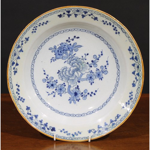 7 - A collection of six 18th and 19th century Delft chargers, the largest 36cm diameter (6)