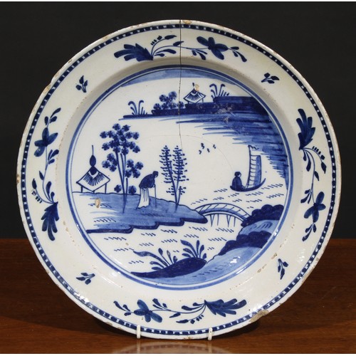 7 - A collection of six 18th and 19th century Delft chargers, the largest 36cm diameter (6)