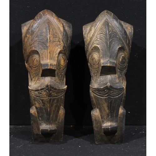 1374 - Tribal Art - a pair of Toba Batak singa architectural guardian ornaments, carved as composite creatu... 