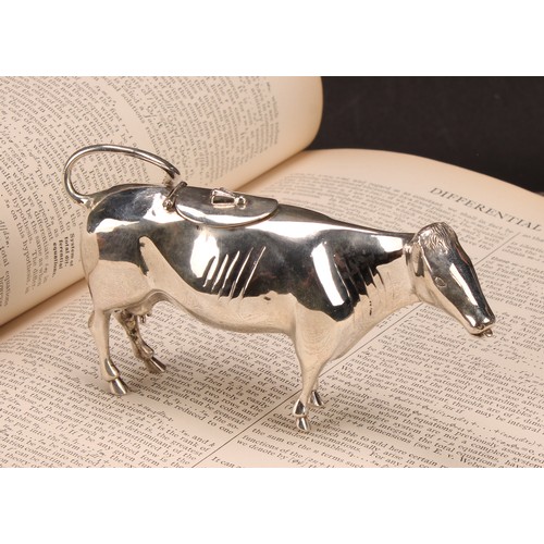 610 - A Dutch silver cow creamer, hinged cover, 13cm long, c.1900, 88g