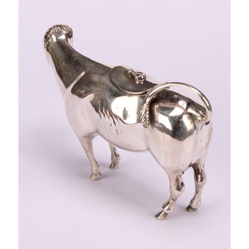 610 - A Dutch silver cow creamer, hinged cover, 13cm long, c.1900, 88g