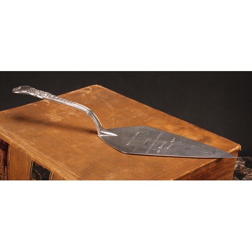 533 - A George IV silver Coburg pattern trowel shaped fish slice, the Hulme at Laying the First Stone of a... 