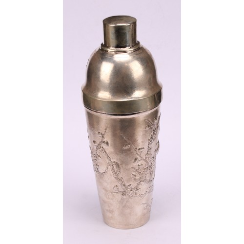 600 - A Chinese silver cocktail shaker, chased with blossoming prunus on a textured ground, 24cm high, cha... 