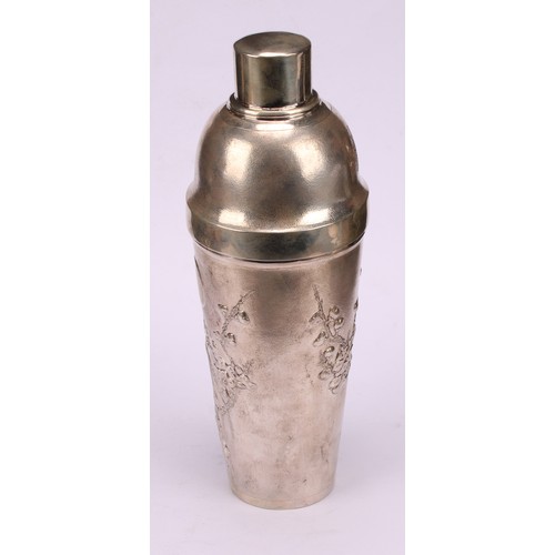 600 - A Chinese silver cocktail shaker, chased with blossoming prunus on a textured ground, 24cm high, cha... 