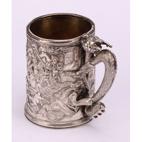 598 - A Chinese export silver mug, double-walled and profusely chased with figures of the court in a lands... 