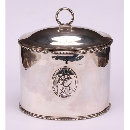 643 - A George III silver oval tea caddy, beaded borders, applied with Neo-Classical oval reserves, hinged... 